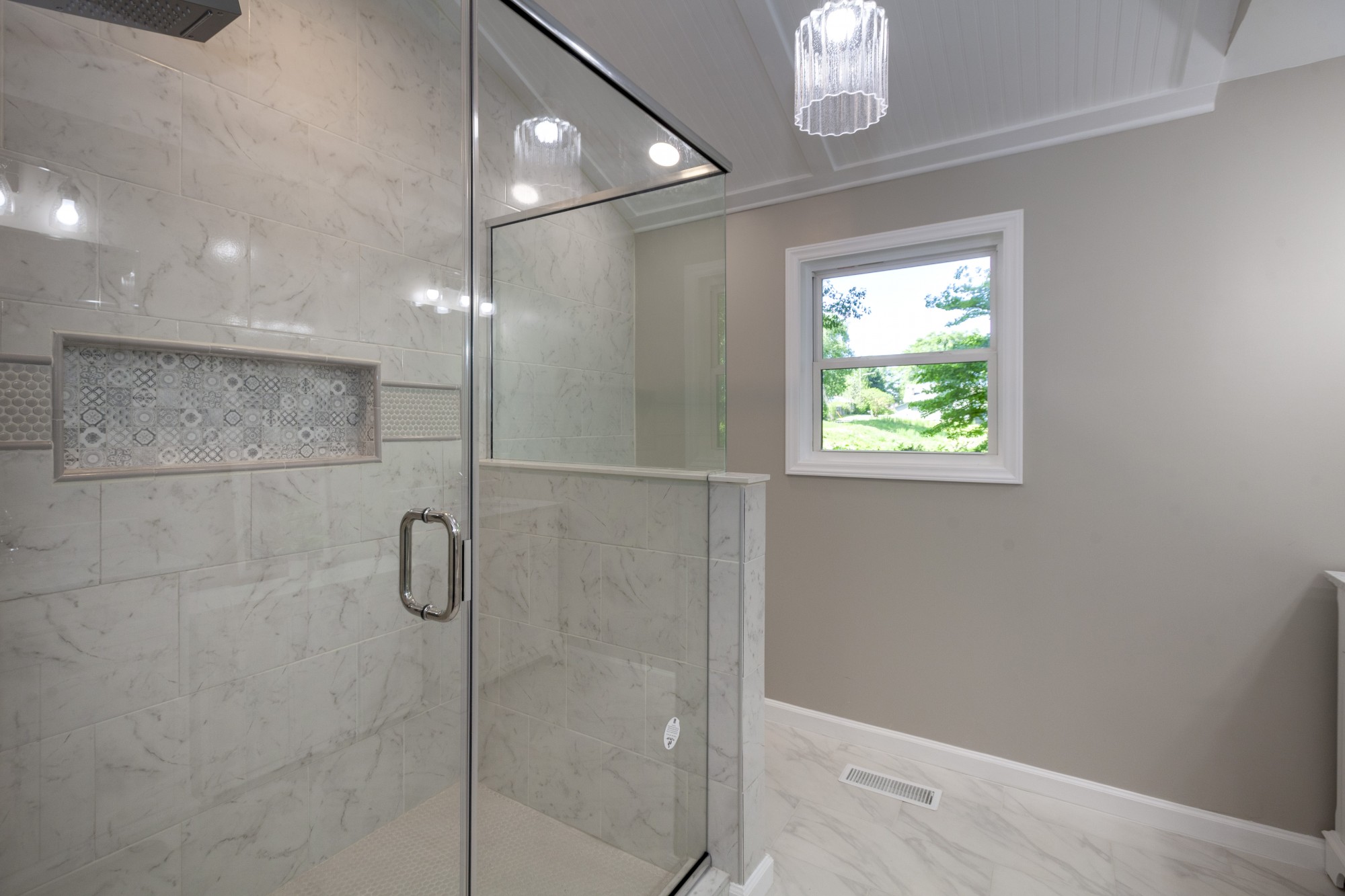 Owner's Shower with Floor-to-Ceiling Tile